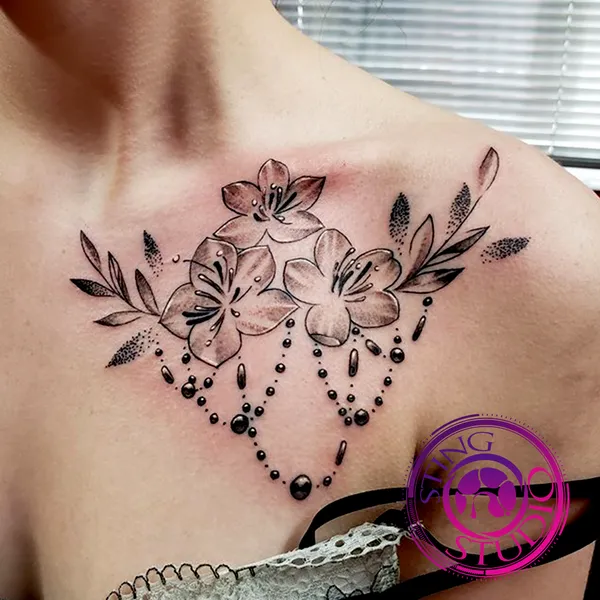 Bejeweled dynamic flower tattoo by Derrick at Sting Studio Ottawa