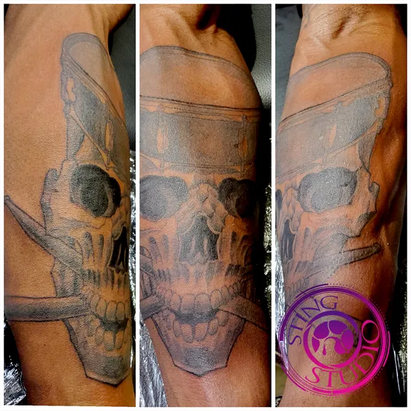 Drummer skull tattoo by Derrick at Sting Studio Ottawa