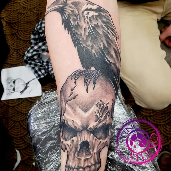 Crow skull tattoo by Derrick at Sting Studio Ottawa