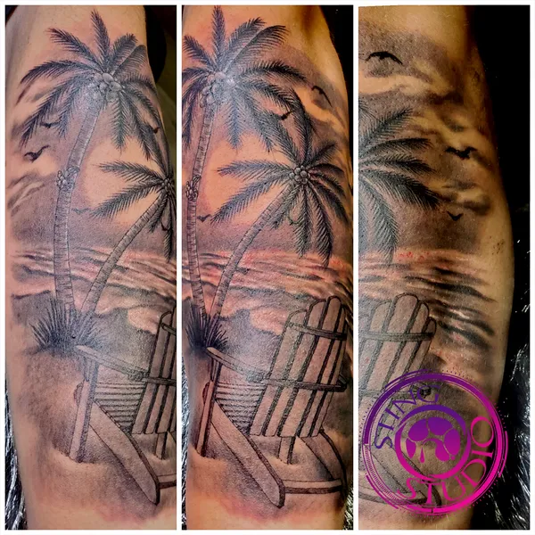 Beach and lawn chair tattoo by Derrick at Sting Studio Ottawa