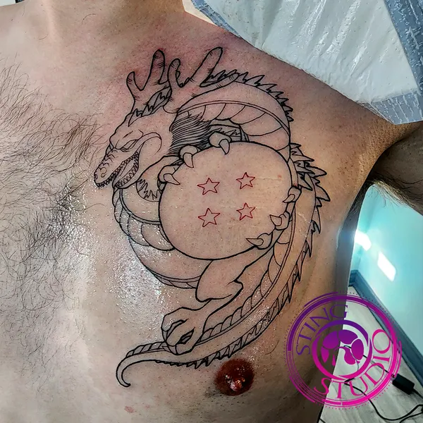 Shenron chest linework tattoo by Derrick at Sting Studio Ottawa