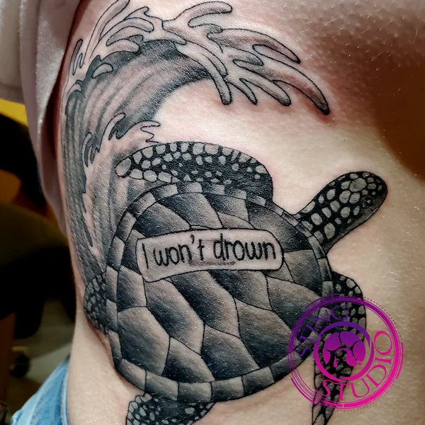 Turtle wave bandaid tattoo by Derrick at Sting Studio Ottawa