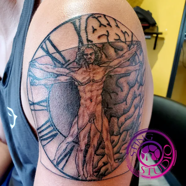 Leonardo da vinci naked man tattoo by Derrick at Sting Studio Ottawa