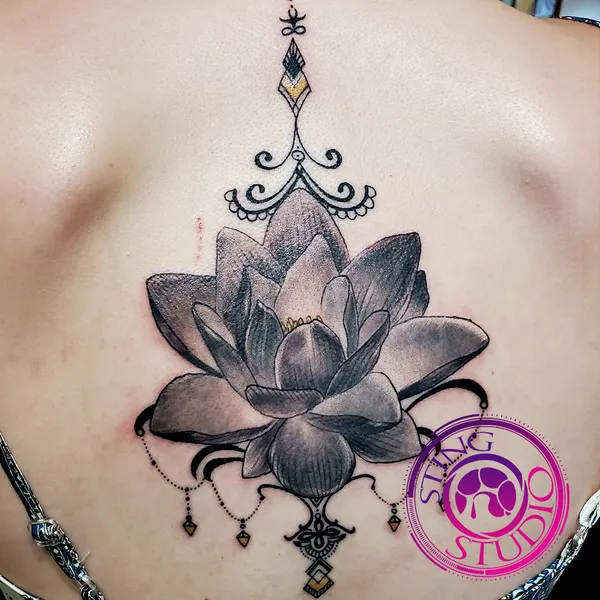 Lotus back tattoo by Derrick at Sting Studio Ottawa