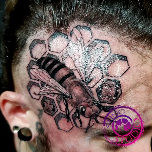 Honey bee scalp tattoo by Derrick at Sting Studio Ottawa