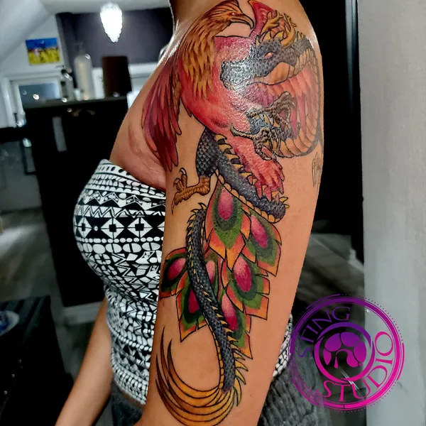 Pheonix dragon tattoo by Derrick at Sting Studio Ottawa