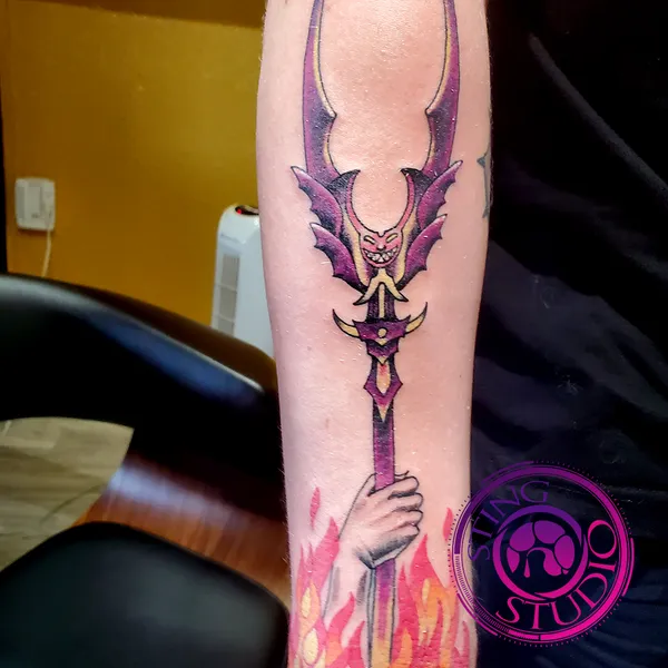 Trident flames tattoo by Derrick at Sting Studio Ottawa