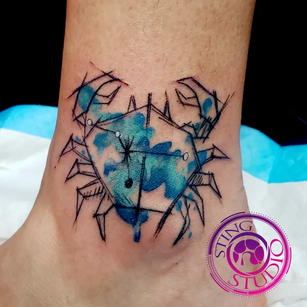 Cancer fineline watercolor tattoo by Derrick at Sting Studio Ottawa
