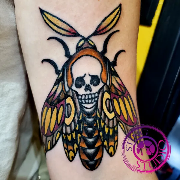 Death moth tattoo by Derrick at Sting Studio Ottawa
