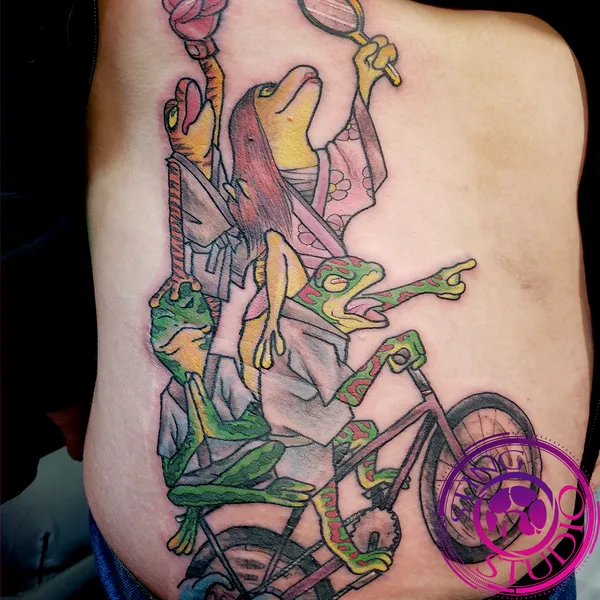 Frogs on a bike tattoo by Derrick at Sting Studio Ottawa