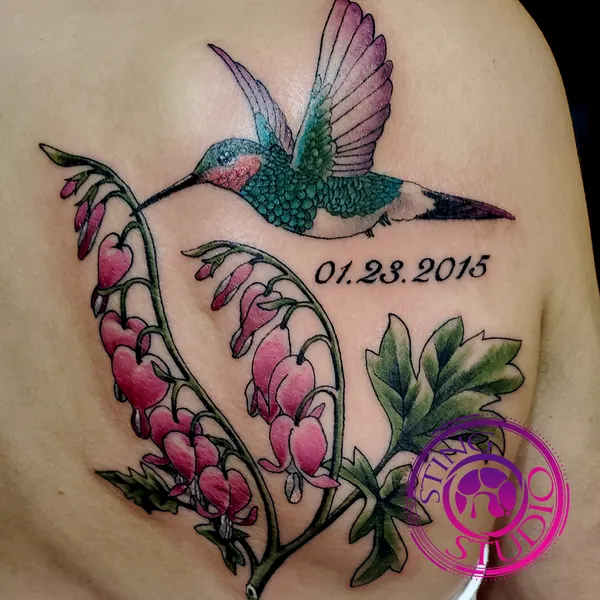 Hummingbird bleeding hearts tattoo by Derrick at Sting Studio Ottawa