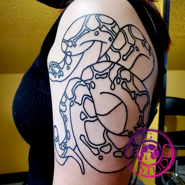 Python linework tattoo by Derrick at Sting Studio Ottawa