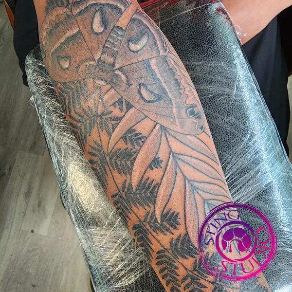 Moth fern leaf tattoo by Derrick at Sting Studio Ottawa