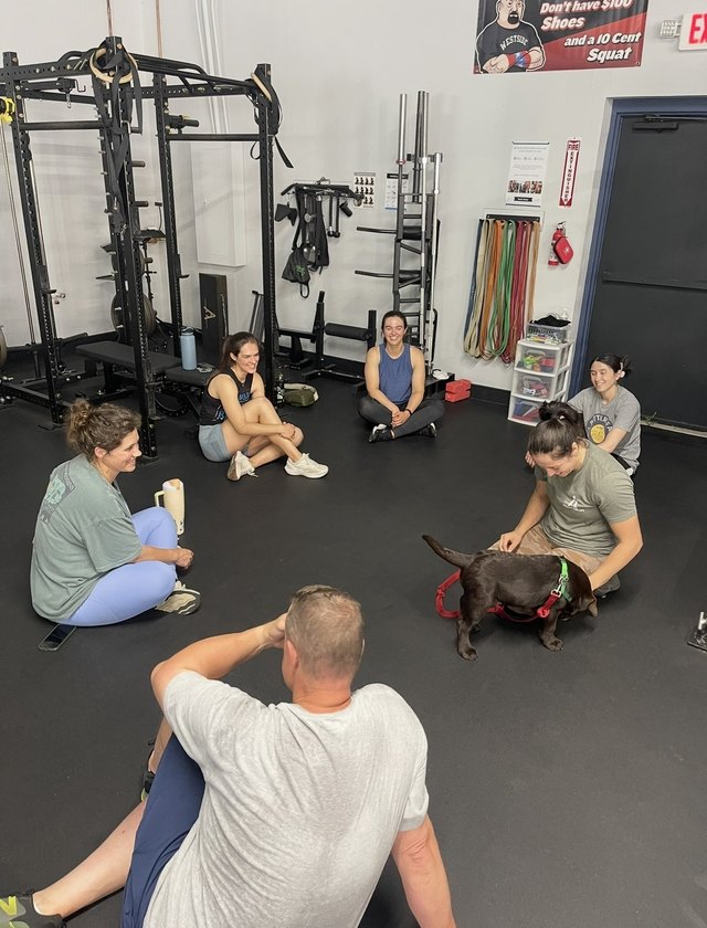 Members talking on the gym floor