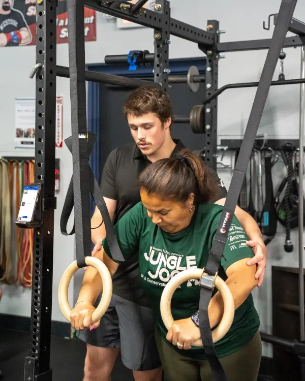 Coach Caleb working with a personal training client