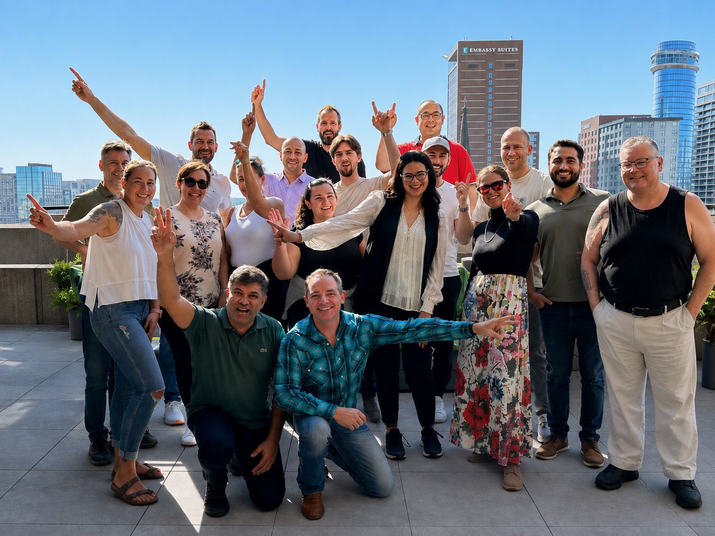 A group celebrating together on a Nashville rooftop.