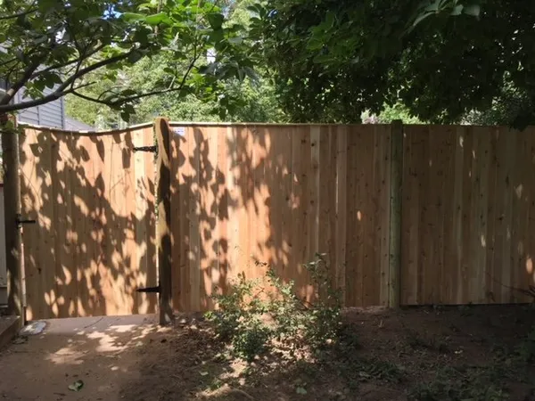 Wood privacy fence and gate by All Fenced In