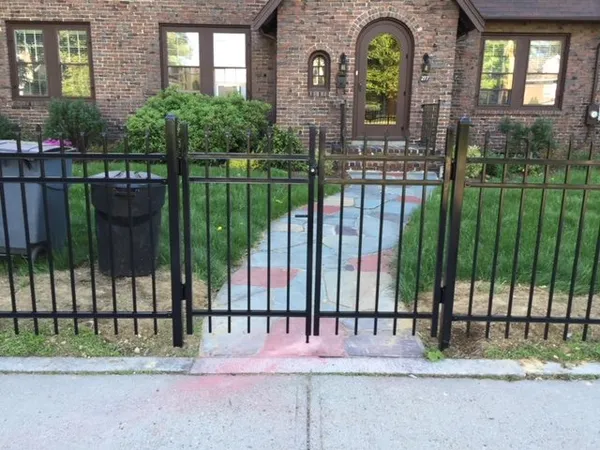 Black aluminum fence and gate by All Fenced In