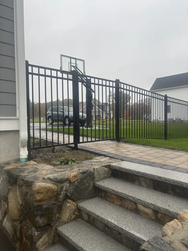 Black metal fence and walk gate by All Fenced In