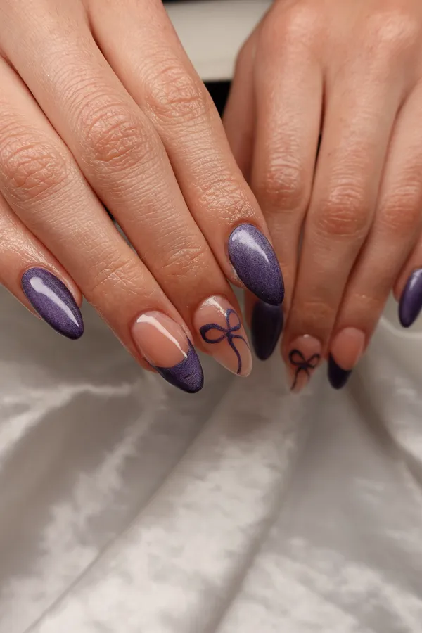Purple French tip almond nails with bow nail art