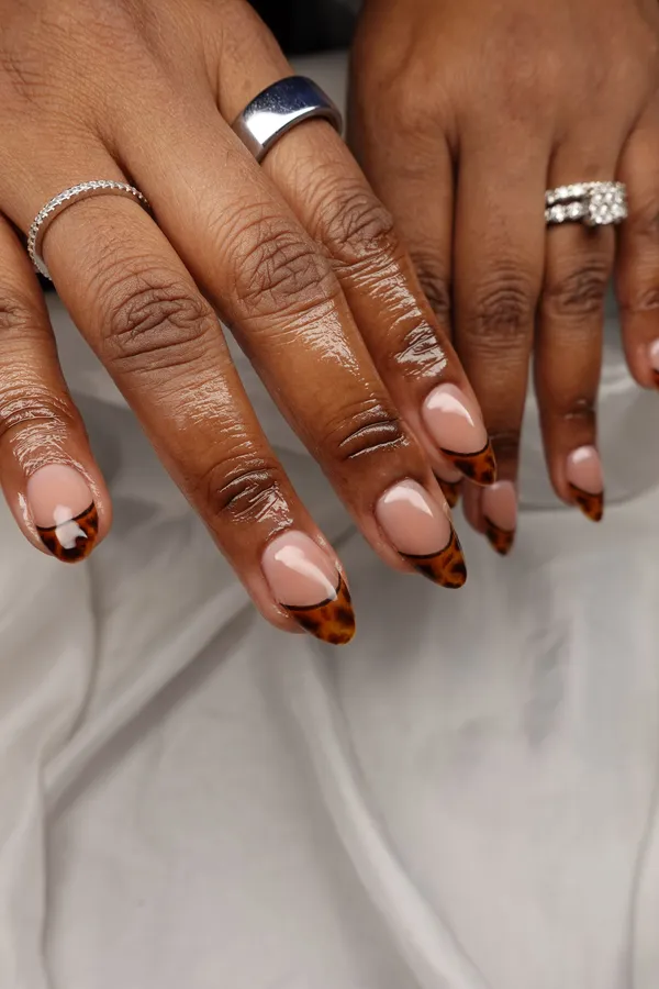 Tortoiseshell French tip almond nails