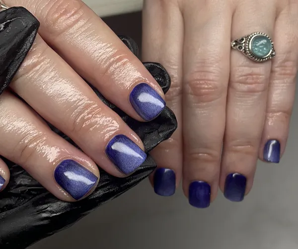 Navy blue cat eye nails