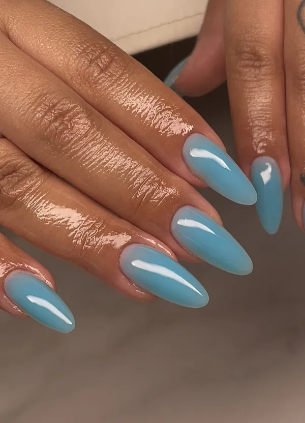 Glossy baby blue almond nails