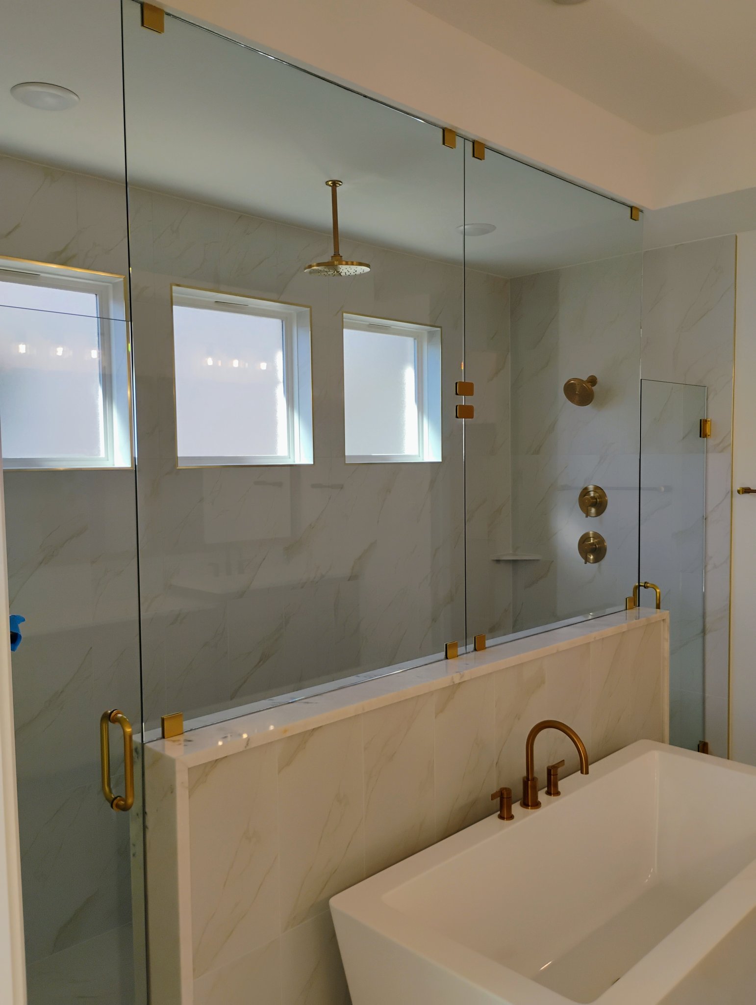 Frameless glass shower installed by GlassTastic