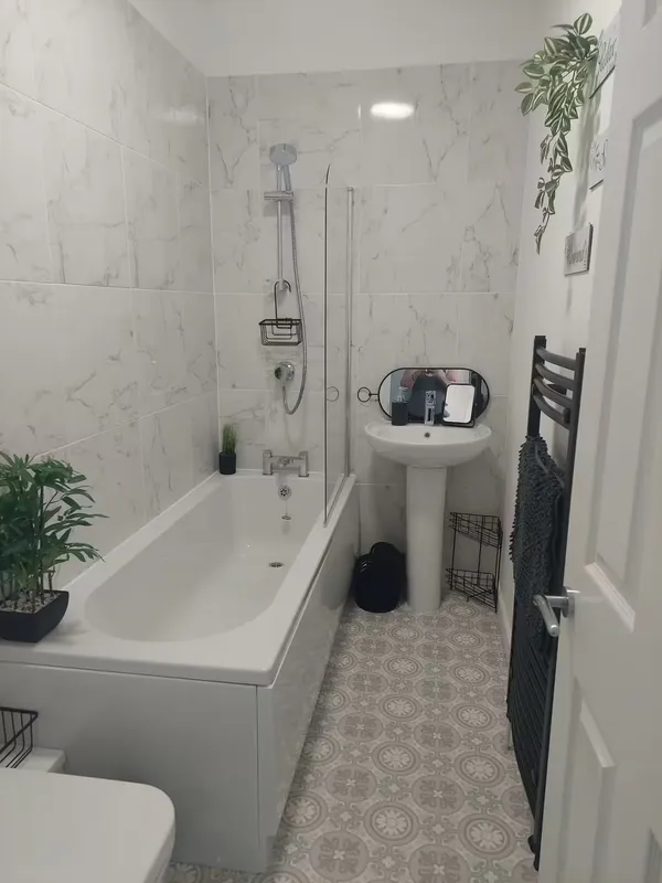 Bathroom with bath and shower at the Barnsley home