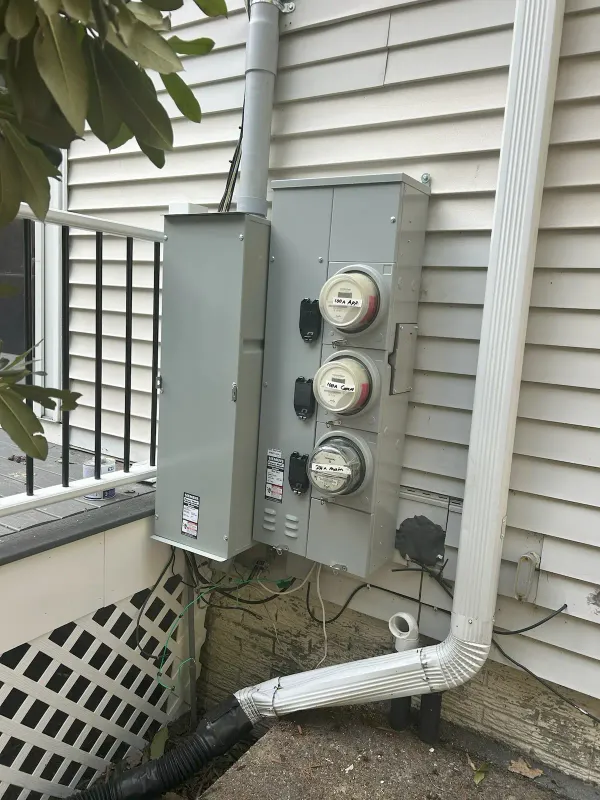 After: exterior meter installation at a multi-family property