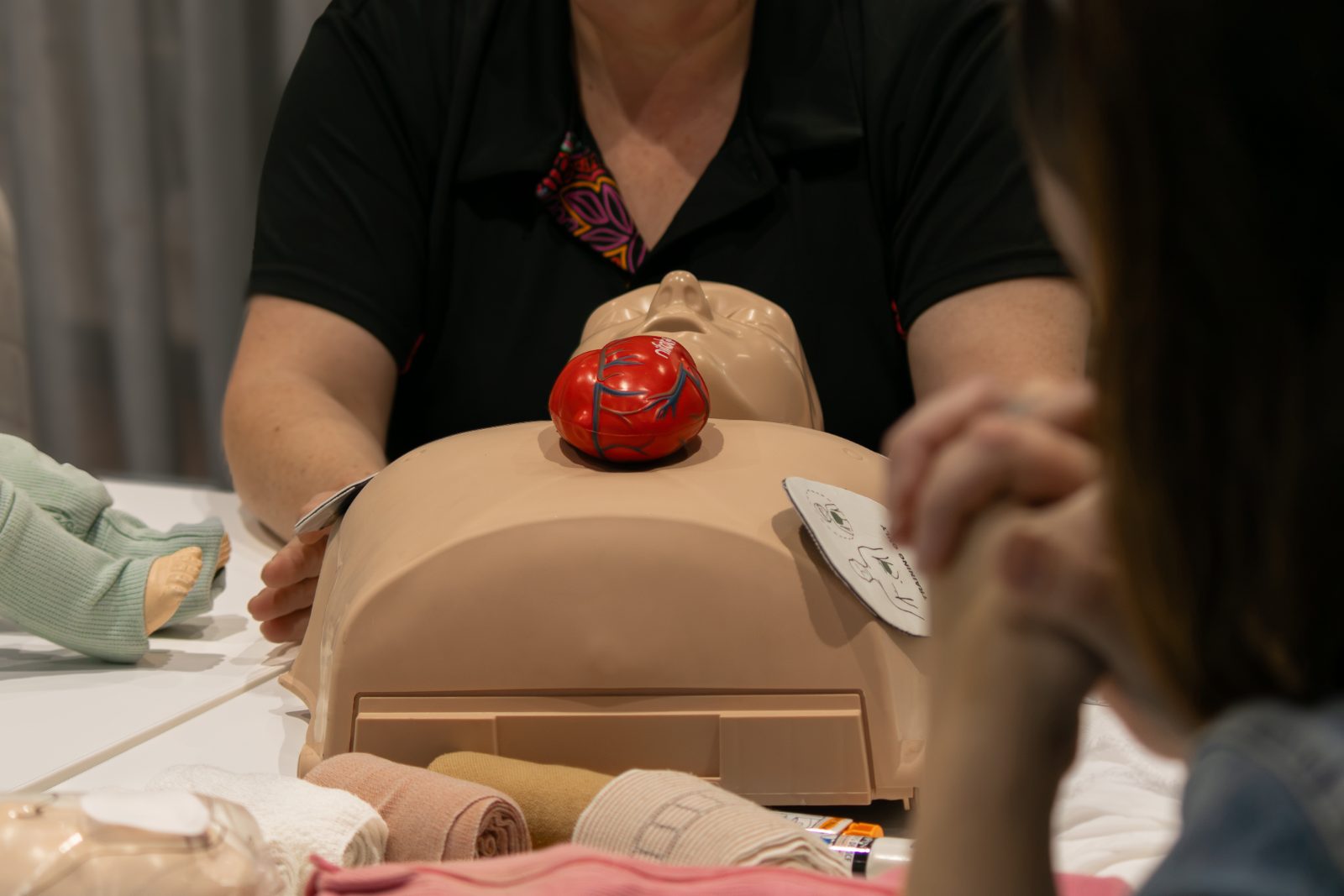 DRSABCD action plan being taught in a first aid class