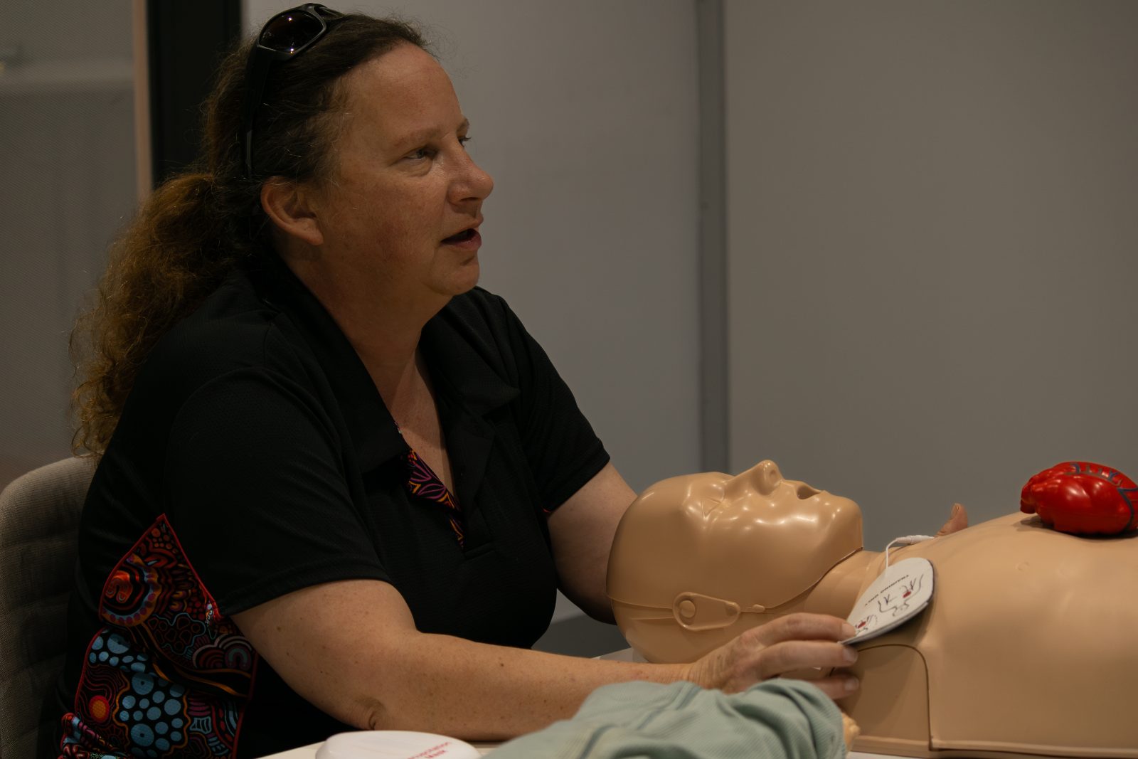 CPR compressions practised on a manikin