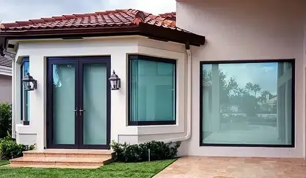 Impact window installation on South Florida residential home