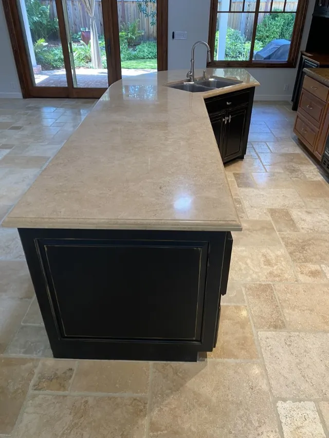 Travertine kitchen island countertop and floor professionally polished and sealed in San Jose CA