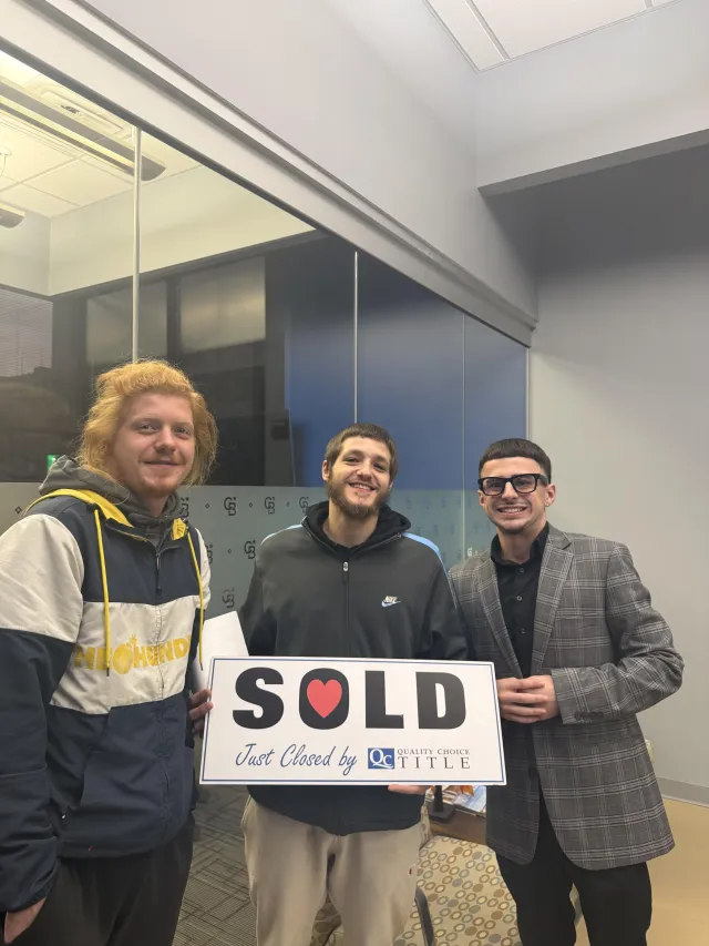 Brenden Gutbrod with a client after closing