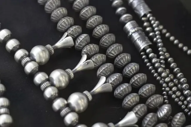 Strands of sterling silver beads