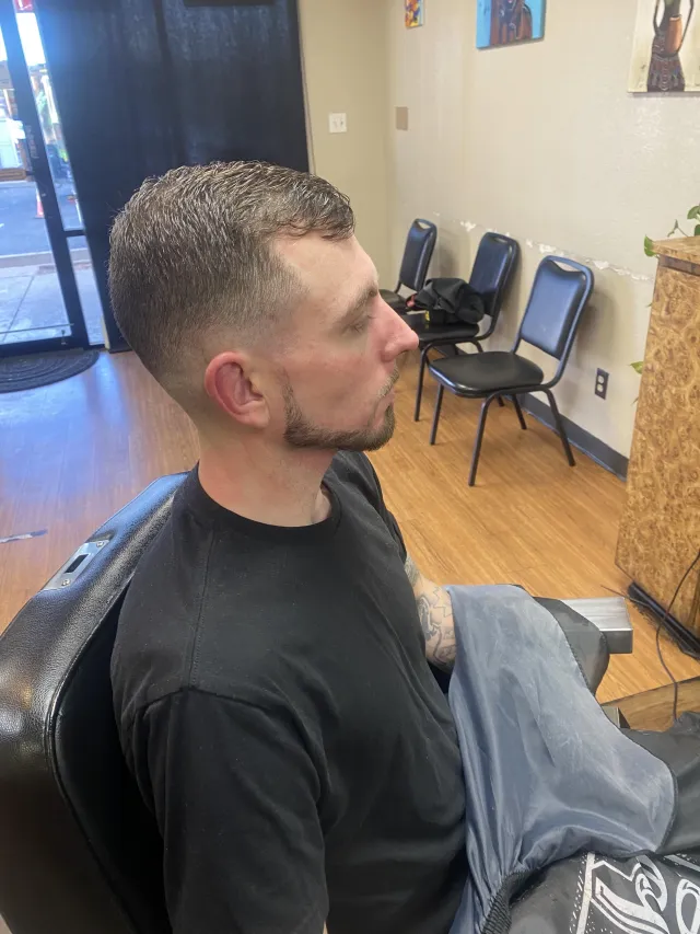 Clean skin fade finished in the barber chair