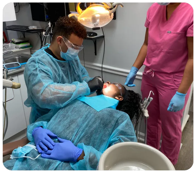 Dental assisting students practicing chairside skills