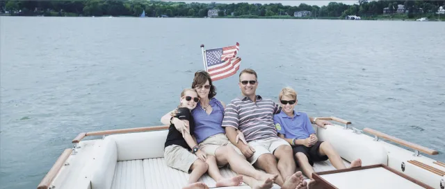 A family spending time aboard a boat