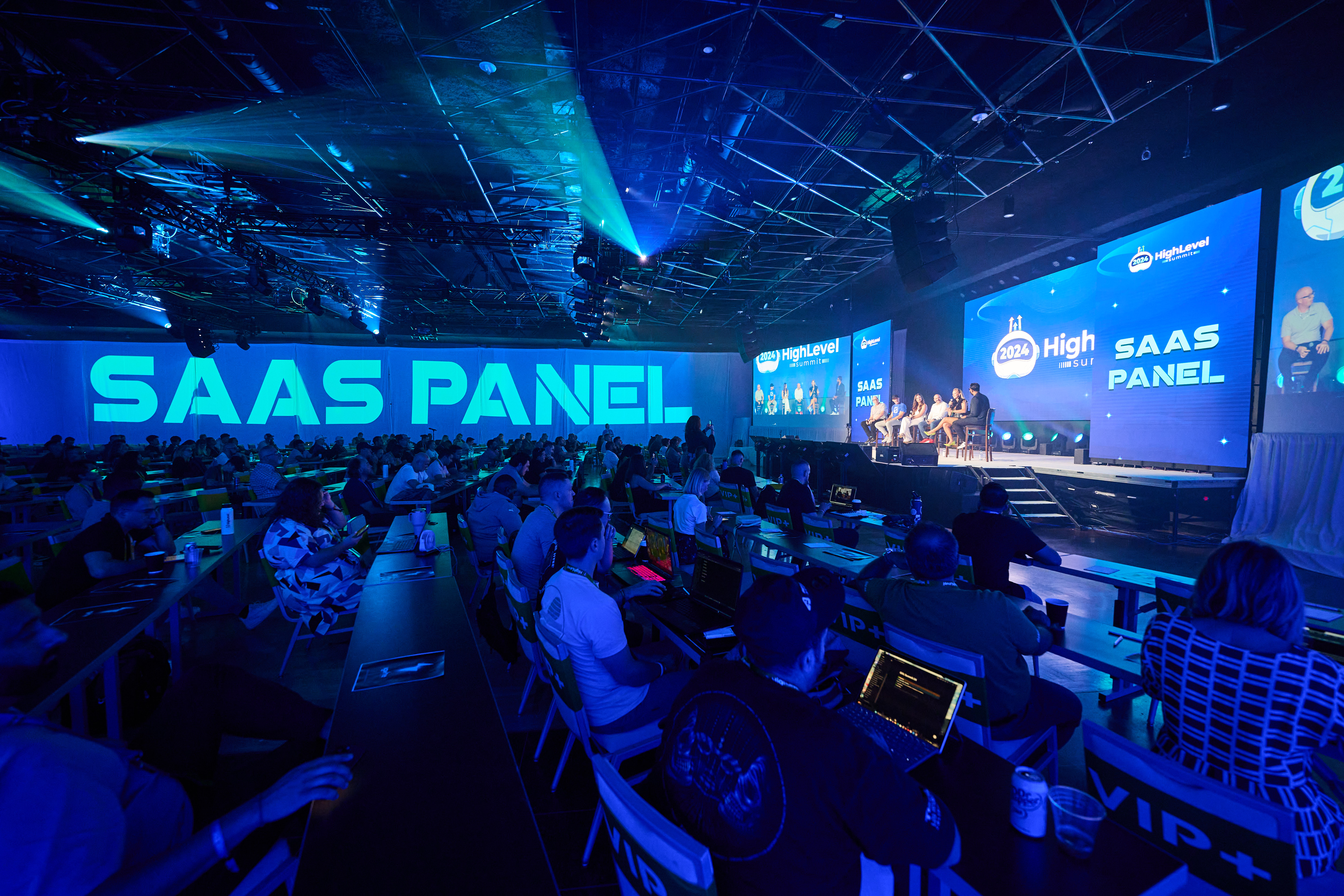 Sarah Cordiner on an arena stage SaaS panel