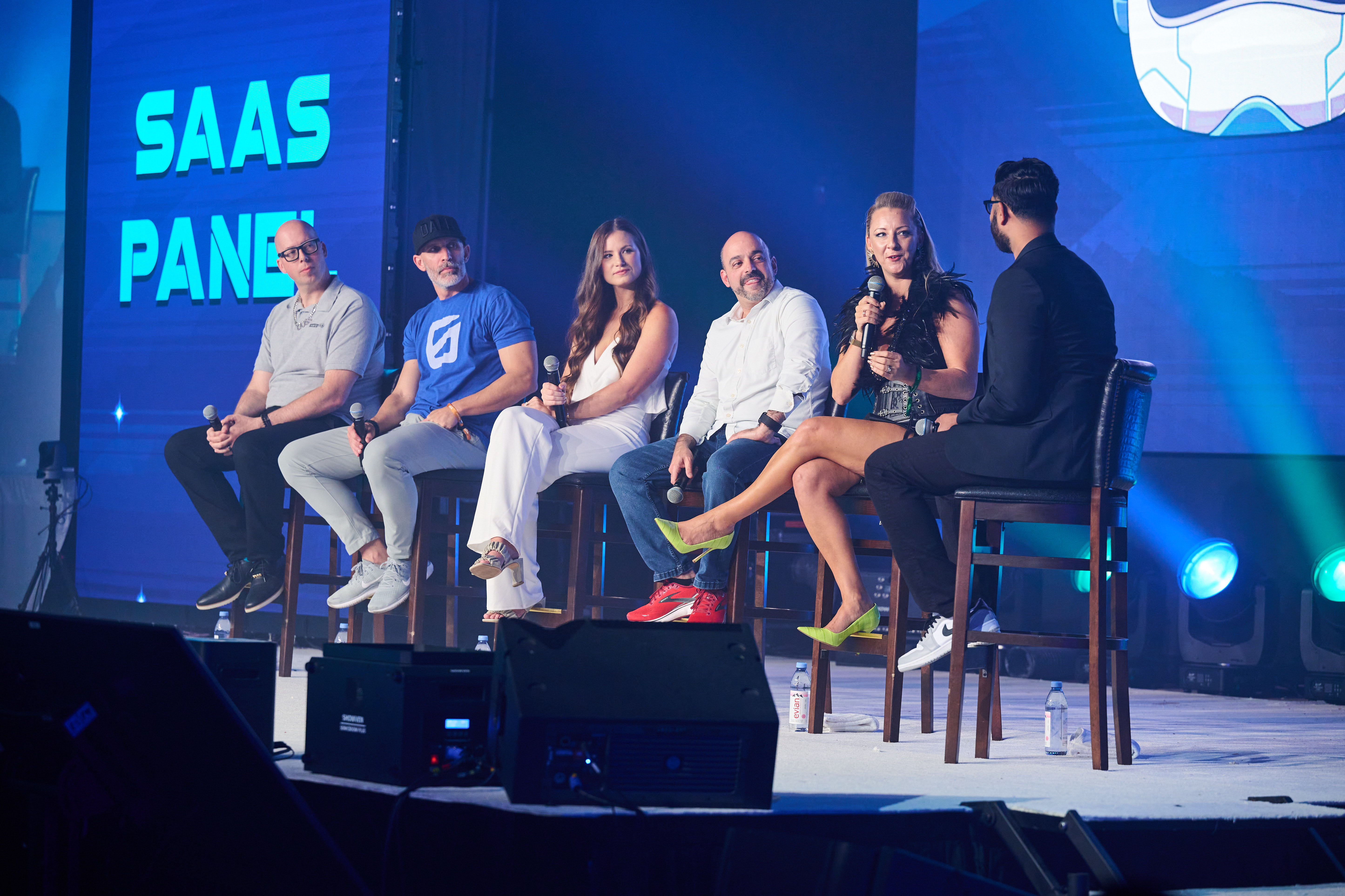 Sarah Cordiner seated on a conference panel