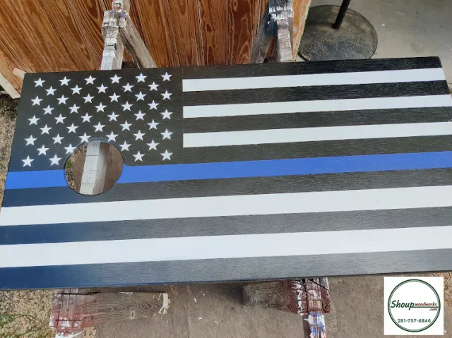 Thin Blue Line flag cornhole board, custom made in Houston by Shoup Woodworks