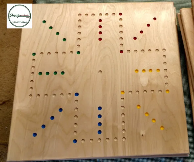 Four-player wooden Wahoo board with colored marble holes, handmade in Houston by Shoup Woodworks