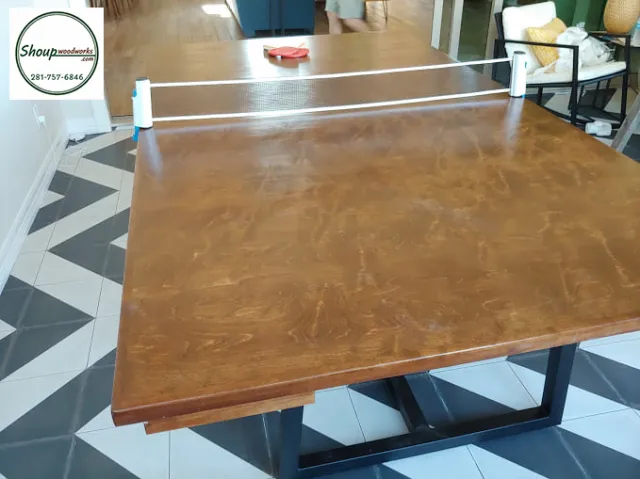 Close-up of a handmade wood ping pong table top and net by Shoup Woodworks, Houston