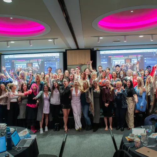 Large group of attendees with Sarah Cordiner