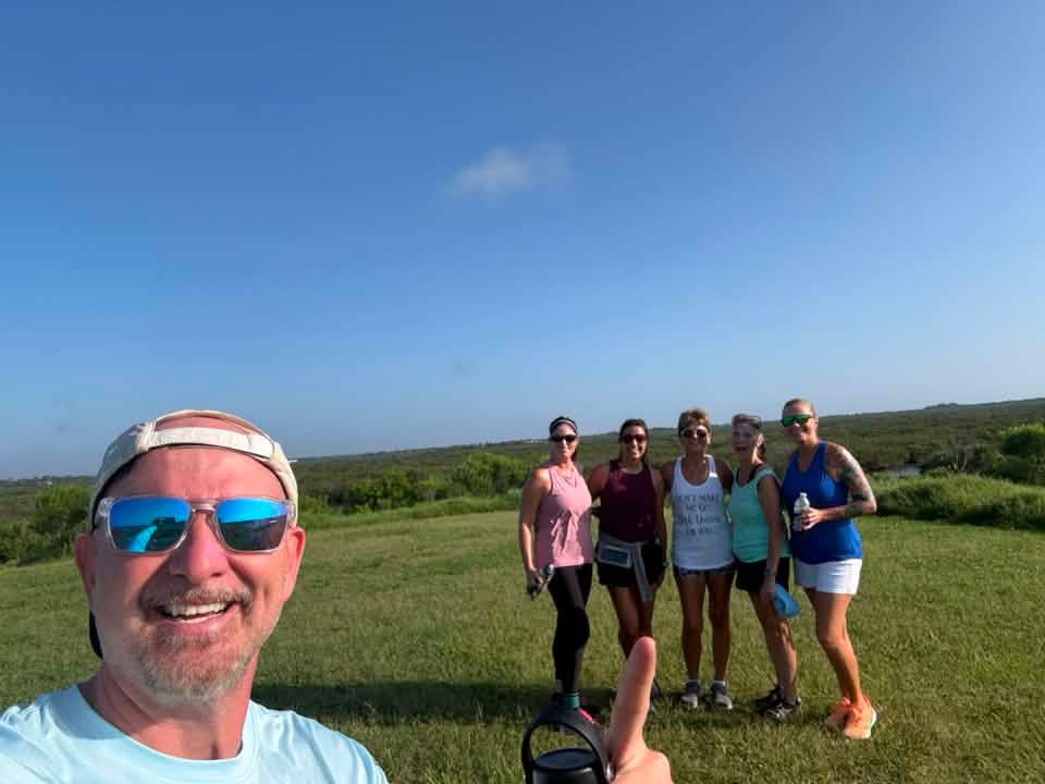 Jason with the group after a walk in the field