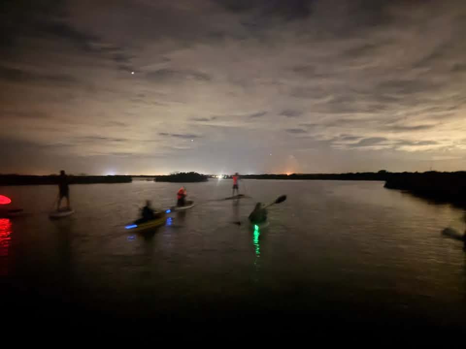 Fit Life NSB night paddle, glow lights on the water