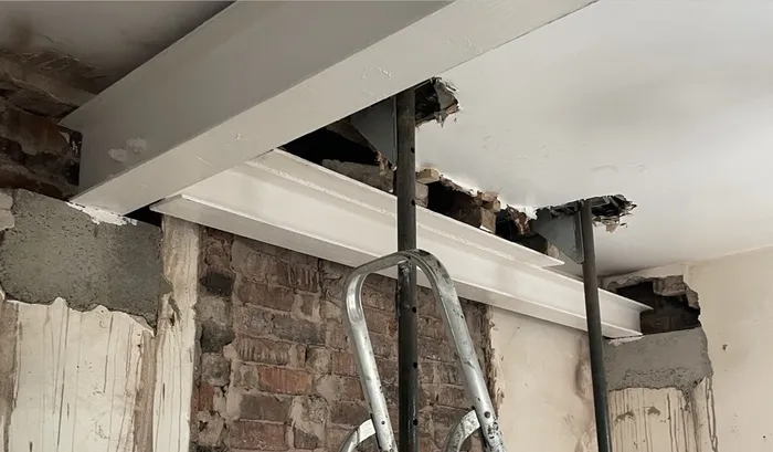 New steel beams supporting an opened-up wall