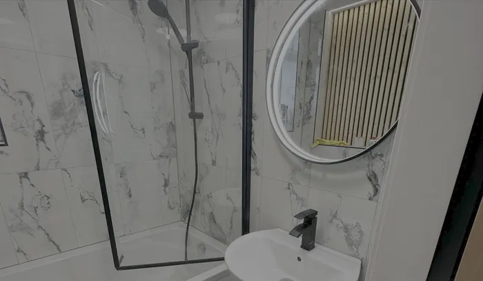 Renovated bathroom with walk-in shower