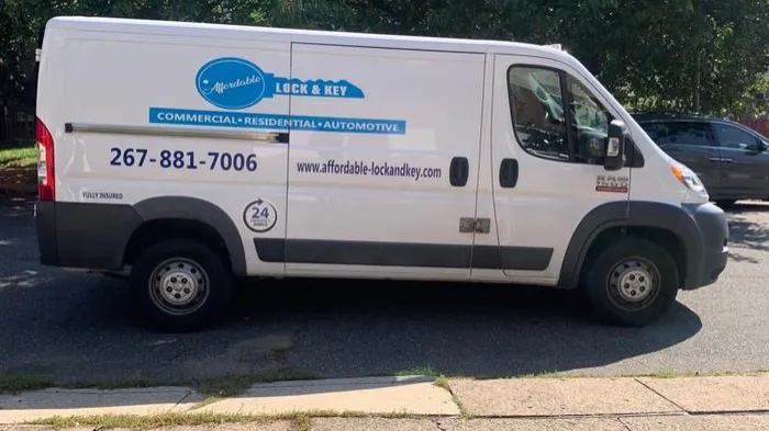 Affordable Lock & Key van with the business phone number on its side